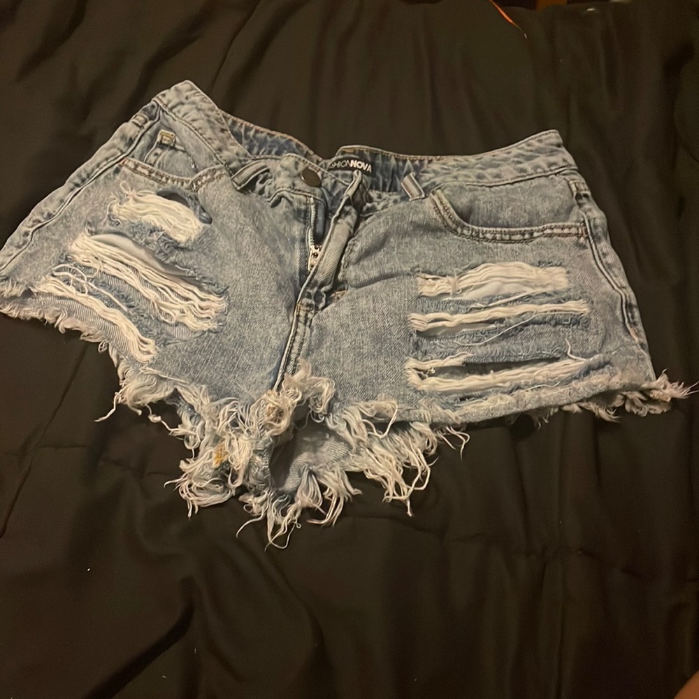 Distressed/ acid wash denim shorts